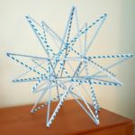 straw star made from light blue/white straws